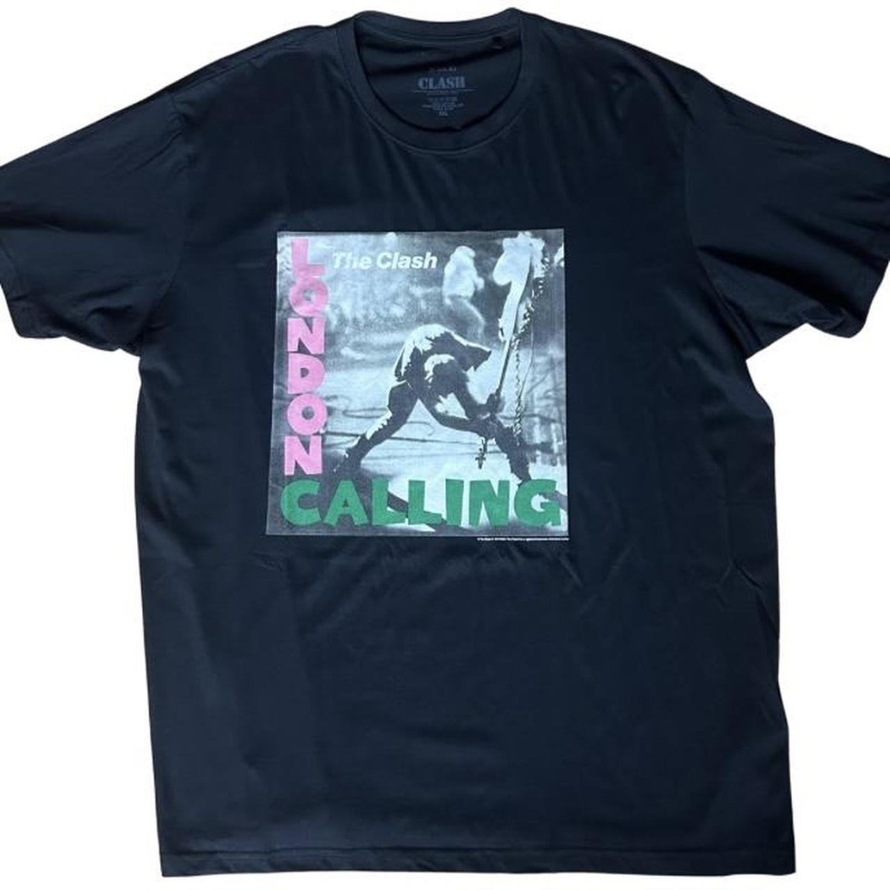 The Clash “London Calling” graphic tee featuring the iconic bass smash artwork with the pink and gre